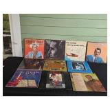 Collection of Classic Vinyl Records Featuring Various Artists