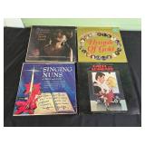 Collection of Classic Vinyl Records Featuring Various Artists