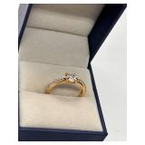 Elegant Gold Engagement Ring with Sparkling Stone