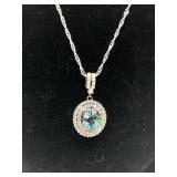 Elegant Silver Necklace with Blue Gemstone Pendant