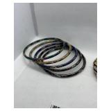 Collection of 10 Assorted Bangles with Enamel and Metal Designs