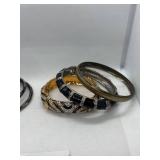 Collection of 10 Assorted Bangles with Enamel and Metal Designs