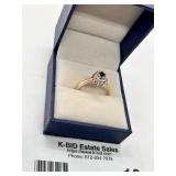 Gold Ring with Red Stone and Clear Accents