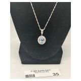 Elegant Silver Necklace with Blue Gemstone Pendant