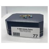 Pair of 14k Gold Earrings with Blue Topaz Stones