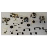 Box of used reels and spare spools - non-functioning reels.