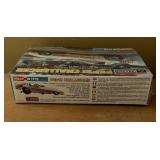 Three New Monogram Snap Tite Model Car Kits including Pepsi Challenger, Blue Max and Budweiser King