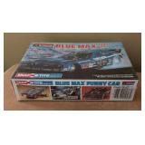 Three New Monogram Snap Tite Model Car Kits including Pepsi Challenger, Blue Max and Budweiser King