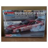Three New Monogram Snap Tite Model Car Kits including Pepsi Challenger, Blue Max and Budweiser King