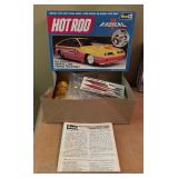 Revell Mooneyes Funny Car, Don Garlits Swamp Rat XXX Dragster and Radical J-2000 Model Car Kits