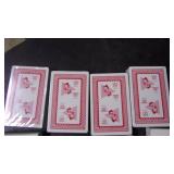 10 new old stock playing cards...