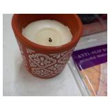 Starbucks, Candle, and Rug Grips in...