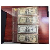 Four 1957 A $1.00 Silver Certificates