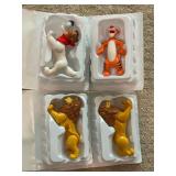 Four Disney Collectable Figurines by McDonald