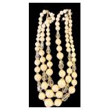 Costume Jewelry including Orange Beaded Necklace and Two Floral Pins