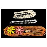 Costume Jewelry including Orange Beaded Necklace and Two Floral Pins