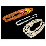 Costume Jewelry including Orange Beaded Necklace and Two Floral Pins