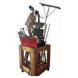 Lot of Outside Tools and Wooden Container with Wheels including Rakes, Mop, Brooms, Shovels and More