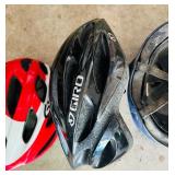 Three Bicycle Helmets in Various Sizes