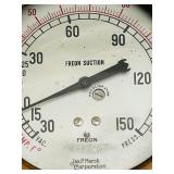 Vintage Treasures including Freon Suction Pressure Gauge and Antique Horse Carriage Buggy Round Cast Iron Step