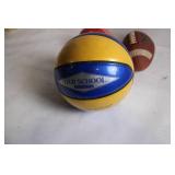 Collection of 4 Sports Balls: Soccer, Basketball, and Two Footballs