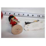 Collection of Holiday Decorations Including Nutcracker, Trees, and Ornaments