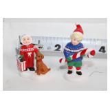 Collection of Holiday Decorations Including Nutcracker, Trees, and Ornaments