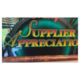 Framed slot machine glass