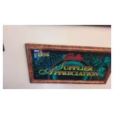 Framed slot machine glass