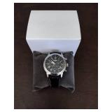 Invicta watch New in box and watch case for displaying watches.