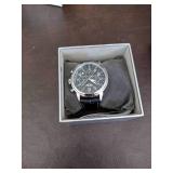 Invicta watch New in box and watch case for displaying watches.