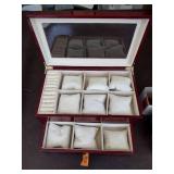 Invicta watch New in box and watch case for displaying watches.