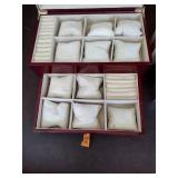 Invicta watch New in box and watch case for displaying watches.