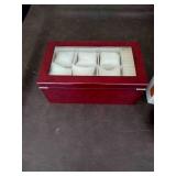 Invicta watch New in box and watch case for displaying watches.