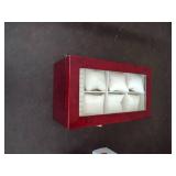 Invicta watch New in box and watch case for displaying watches.