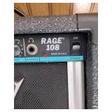 Vintage Johnson by AXL electric guitar with Peavey Rage 108 Amplifier and guitar stand.