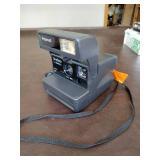 Vintage Polaroid camera (works with film)