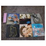 6 records: Hotel California, Head East Live, Golden Earring, GO GOS Beauty & the beat, Love stinks, trex
