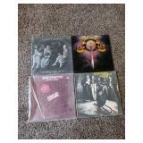 4 Vintage Records: Black Sabbath Heaven and Hell, Toto, Eric Clapton Another Ticket & The Rockets No Ballads.