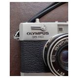 Bushnell binoculars, Olympus 35 RC camera, minolta x-700 camera with bag