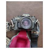 Bushnell binoculars, Olympus 35 RC camera, minolta x-700 camera with bag