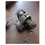 Bushnell binoculars, Olympus 35 RC camera, minolta x-700 camera with bag