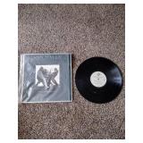 3 records: Foreigner, Rod Stewart, and Van Halen