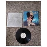 3 records: Foreigner, Rod Stewart, and Van Halen