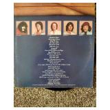 3 records: Foreigner, Rod Stewart, and Van Halen