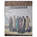 3 records: Foreigner, Rod Stewart, and Van Halen