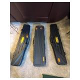 Thompson hard case gun case, Plano hard case gun case, and Thompson Chicago typewriter hard case gun case