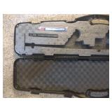 Thompson hard case gun case, Plano hard case gun case, and Thompson Chicago typewriter hard case gun case