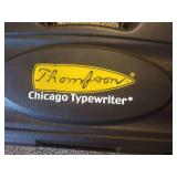 Thompson hard case gun case, Plano hard case gun case, and Thompson Chicago typewriter hard case gun case