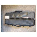 Thompson hard case gun case, Plano hard case gun case, and Thompson Chicago typewriter hard case gun case